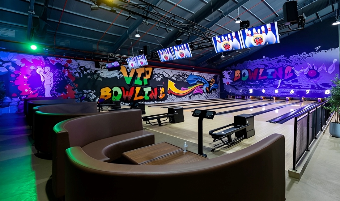 rounded seating in front of 8 bowling lanes H bowling ball lanes brunswick bowling