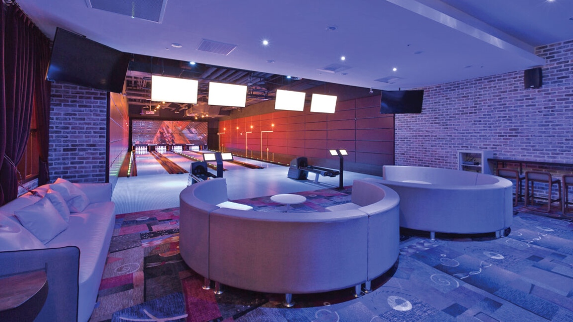 Brunswick distributor - New Hwanan Corporation Let's Roll bowling alley lanes and lounge area