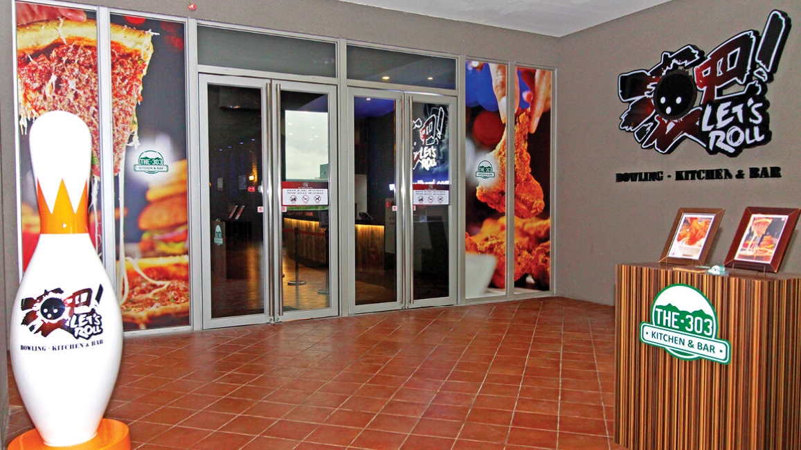 Brunswick distributor - New Hwanan Corporation Let's Roll bowling alley front 