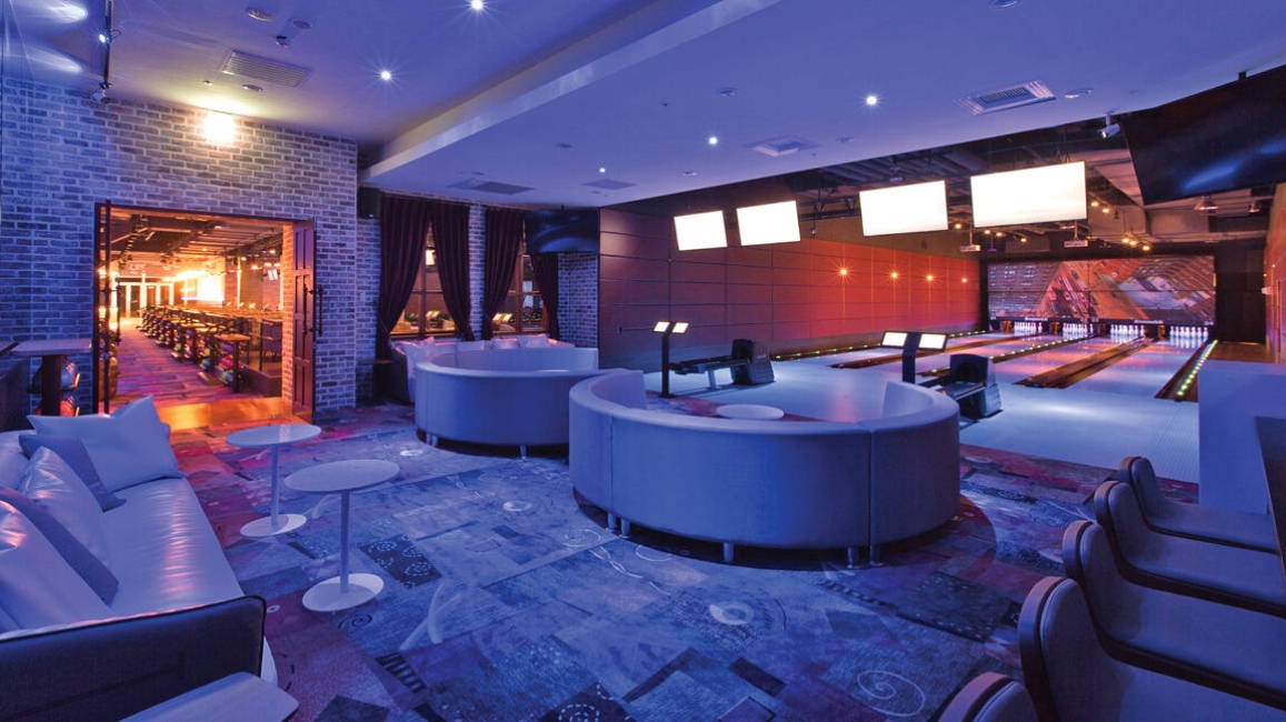 Brunswick distributor - New Hwanan Corporation Let's Roll bowling alley lanes and lounge area