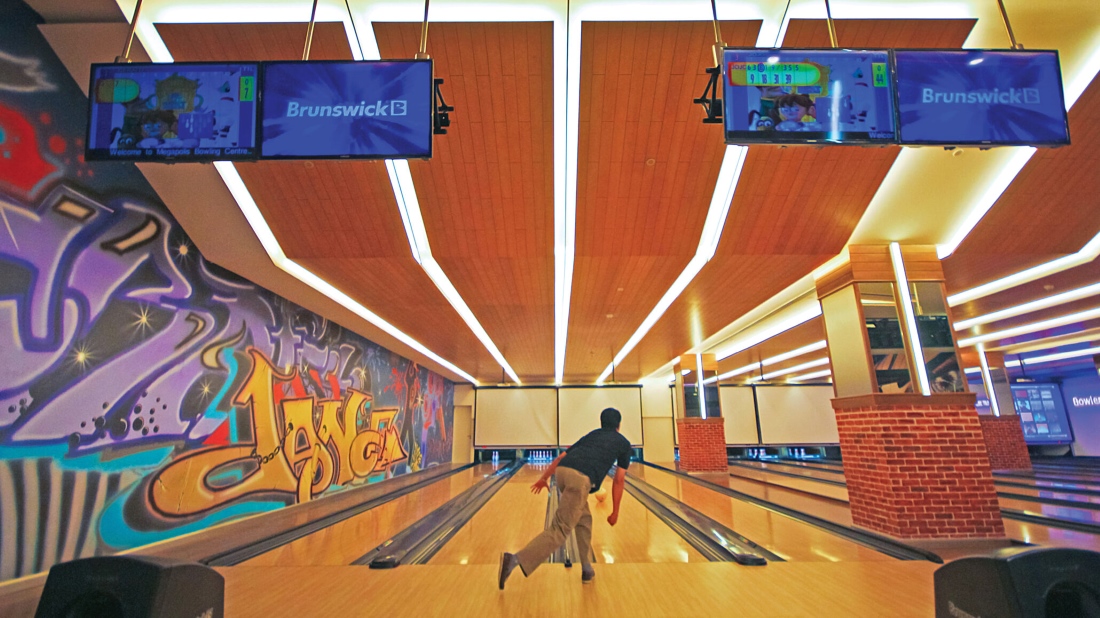 Megapolis Entertainment Center bowling alley lanes in use, Doha, Qatar